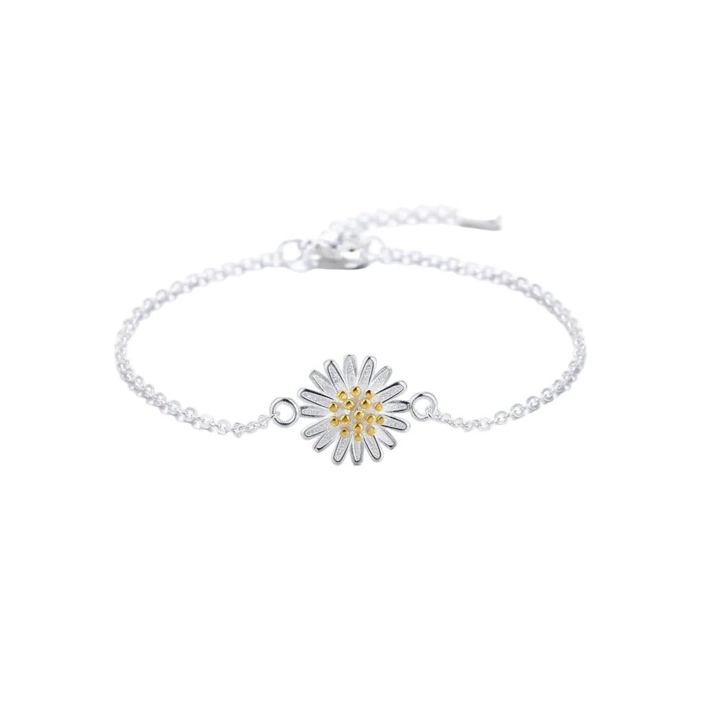 Silver necklace with a daisy flower pendant on a white surface